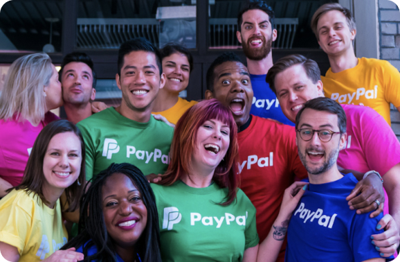 Group picture of paypal employees, smiling