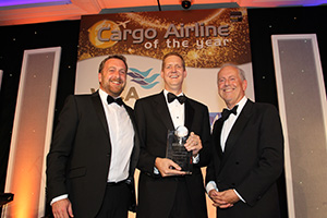 WCA's Dan March presents the award to American's Jim Butler.