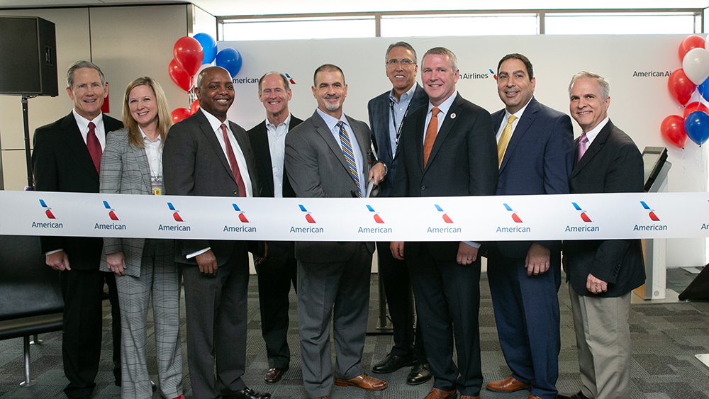 Leaders from American, Envoy and DFW Airport celebrate the opening of the Terminal E satellite