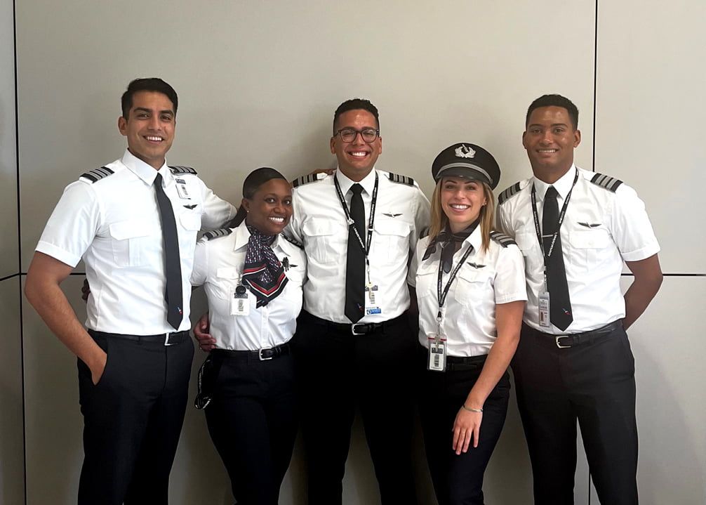 A group of people participating in the American Airlines Cadet Academy program