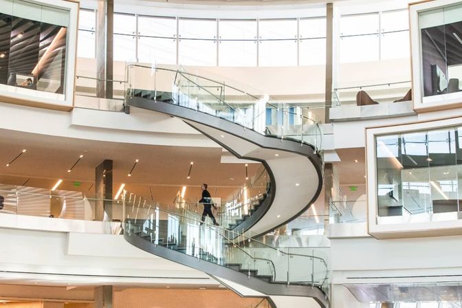 A dramatic spiral staircase in an open atrium